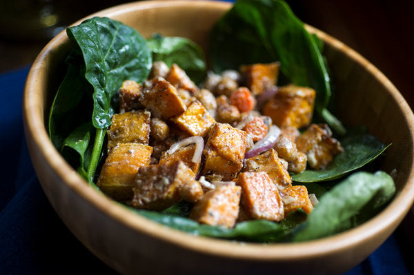 Spinach Salad with roasted vegetables and spiced chickpeas